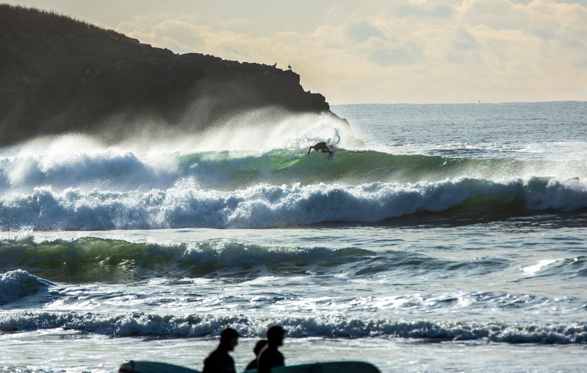 Surfer in the barrel at Tofino, British Columbia