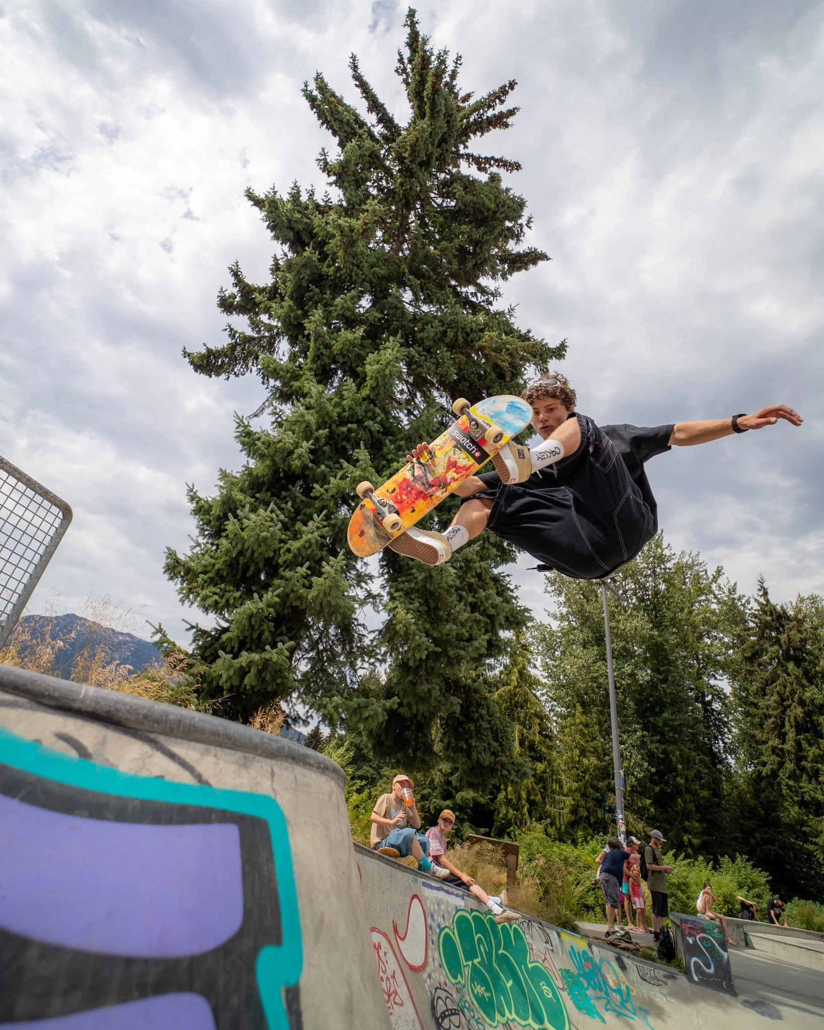 Andy Anderson ollie over obstacle in urban skateboarding session