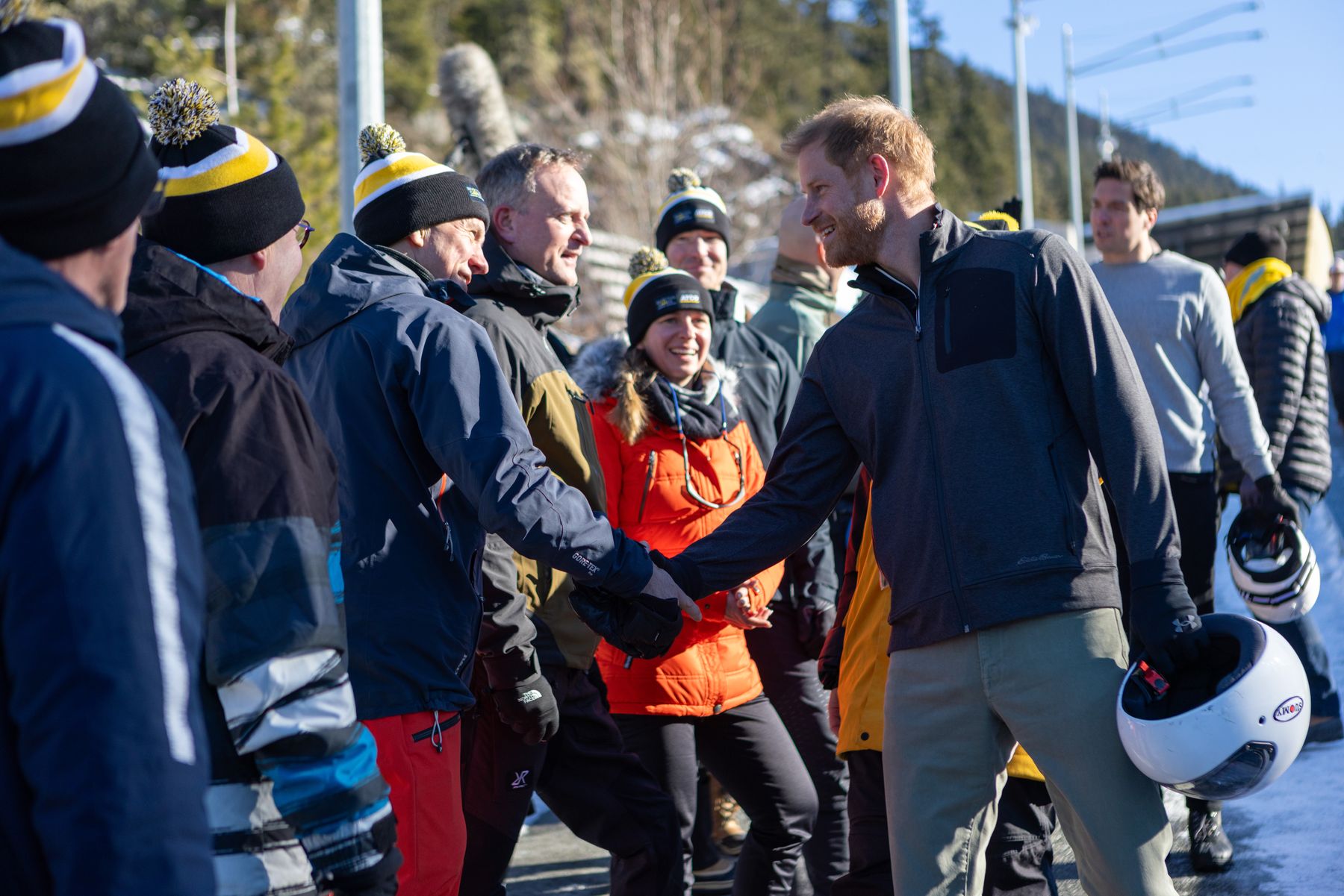Prince Harry greeting Invictus competitors at the Whistler Sliding Centre