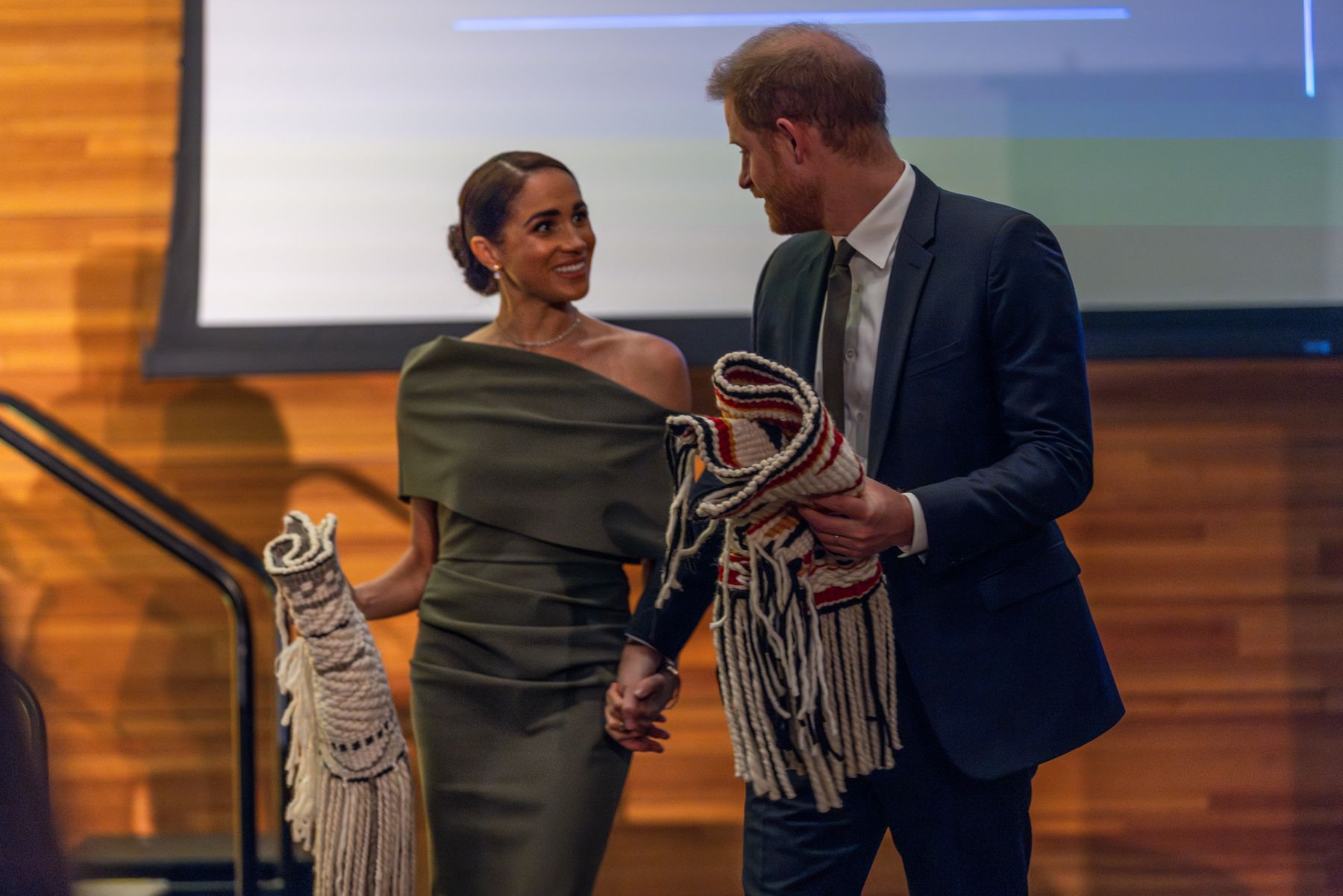 The Duke and Duchess of Sussex receiving a gift at the Evening with the First Nations
