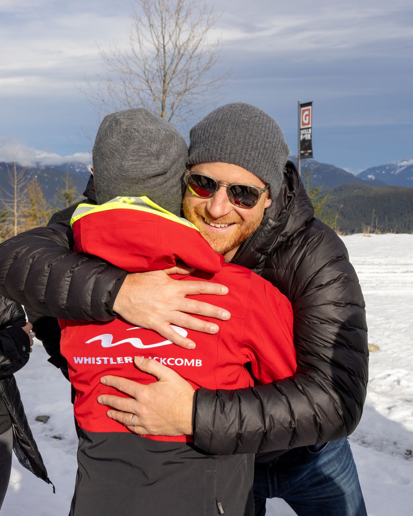 Prince Harry hugging a Whistler Blackcomb staff member