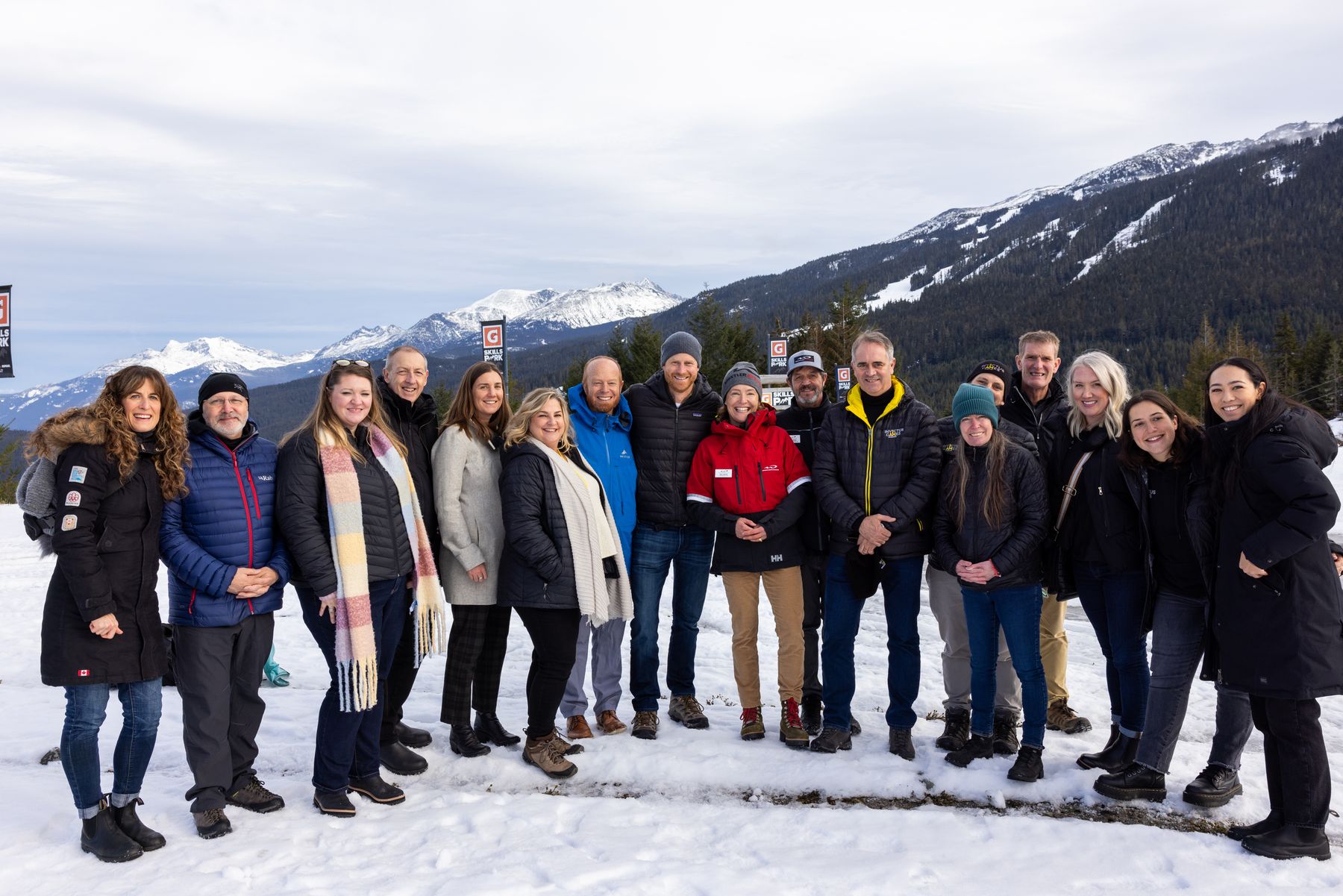 Prince Harry with the Invictus Games delegation in front of the Whistler mountains