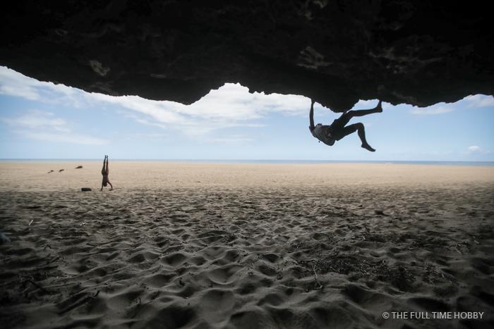 Climber Under a Beach Overhang, Hawaii