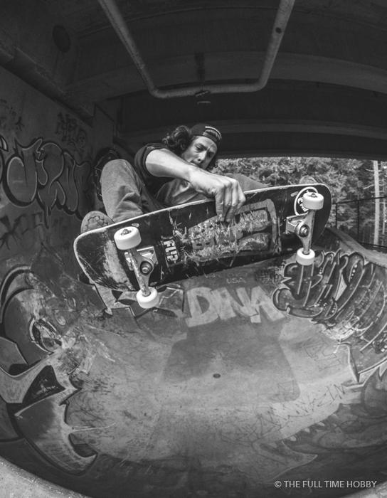 Skateboarder in the Bowl, Squamish skate park, Squamish, BC
